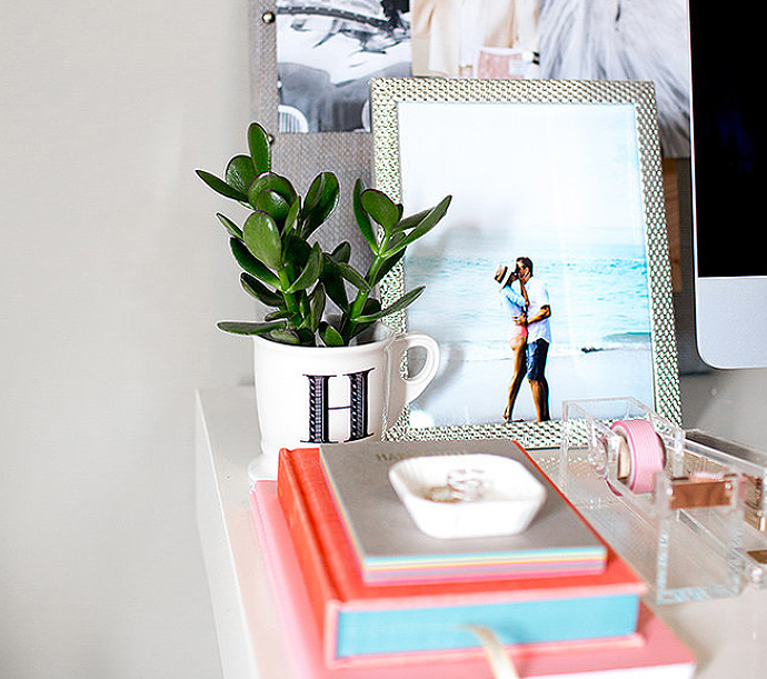 We love how Christine paired personal photos with inspiring cutouts and turned a monogrammed mug into a vase.