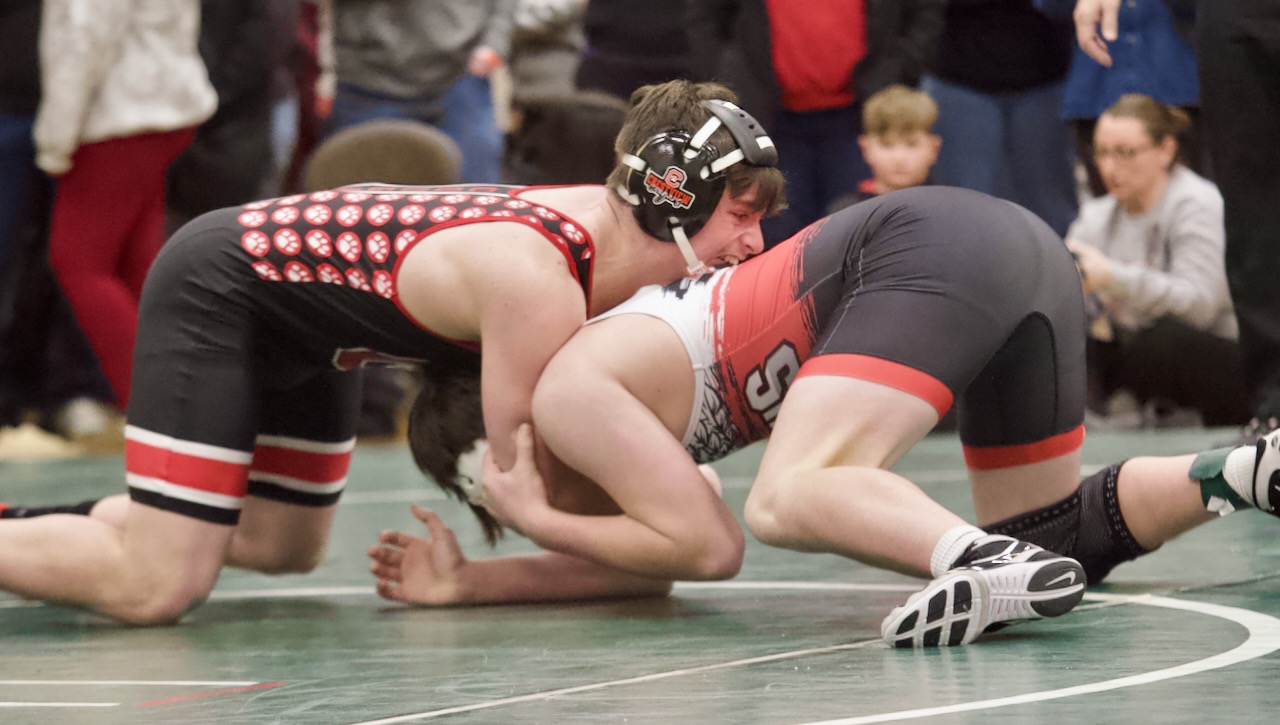 a wrestler controls an opponent