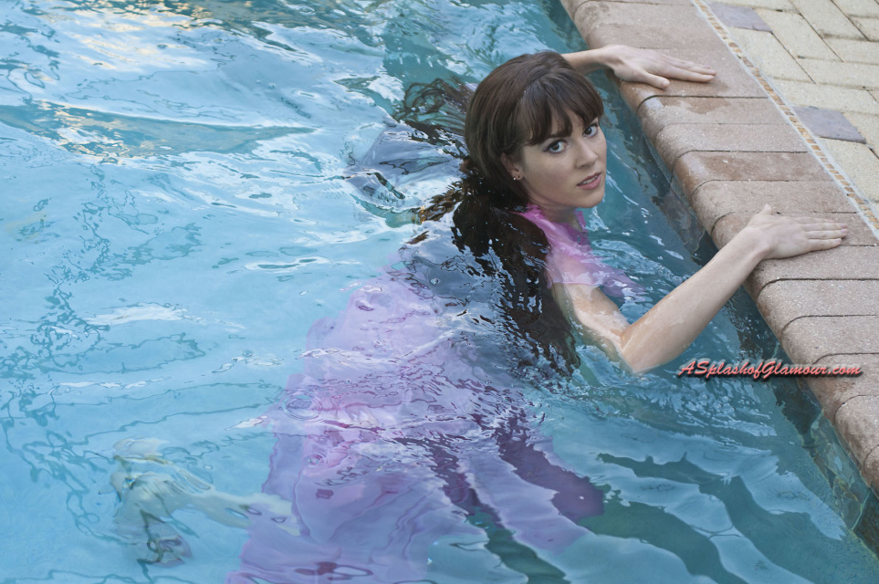We may earn commission from links on this page, but we only recommend products we back. Isobel Wren pink gown does an underwater photoshoot - SOG629