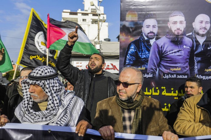 Palästinenser an einer Trauerveranstaltung für die drei Terroristen, die von israelischen Streitkräften getötet wurden, 09. Februar 2022. Foto IMAGO / ZUMA Wire Palästinenser an einer Trauerveranstaltung für die drei Terroristen, die von israelischen Streitkräften getötet wurden, 09. Februar 2022. Foto IMAGO / ZUMA Wire