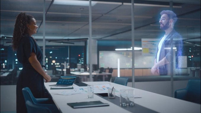 Hologram Communication India “बिज़नेस मीटिंग में होलोग्राफिक प्रोजेक्शन से बात करते लोग”