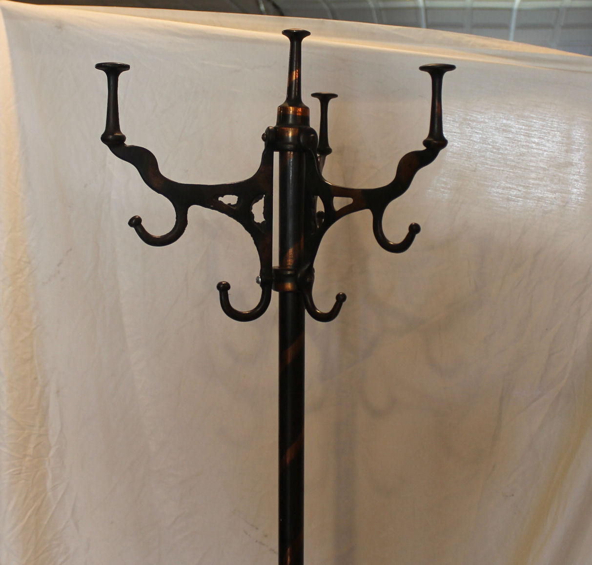 It holds its value but doesn't break the bank, making it a great investment for your cookware collection. Bargain John's Antiques | Cast Iron Coat Rack - copper and
