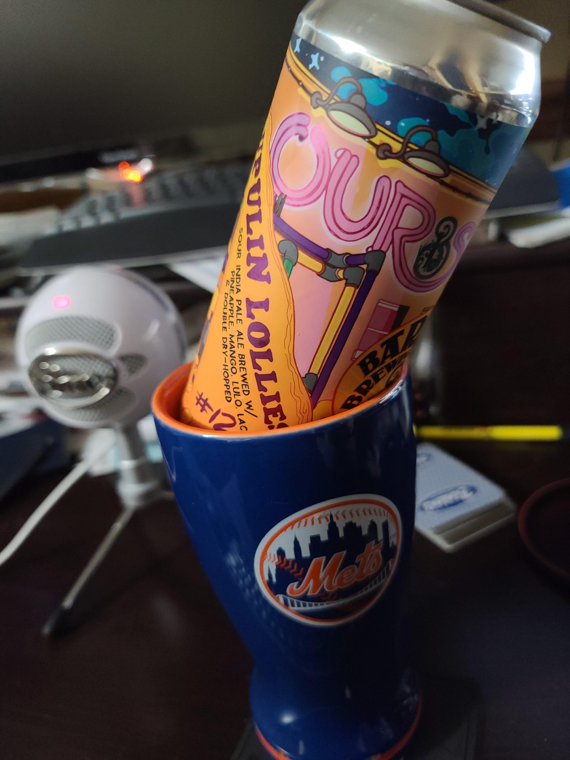 Can of Lupulin Lollies nestled into the top of the Mets ceramic beer glass