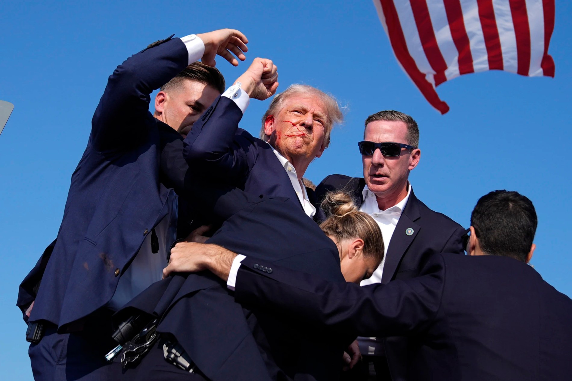 Republican presidential candidate former president donald trump is surround by u S Secret service agents at a campaign rally saturday july 13 2024 in butler pa ap photoevan vucci
