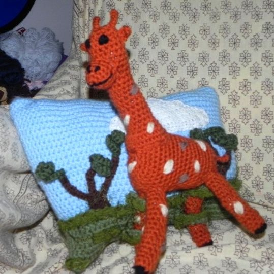 Giraffe with pillow