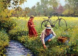 Wildflowers by stream with people