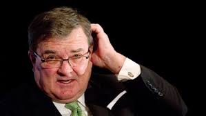 Flaherty scratching head