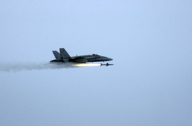 A Royal Canadian Air Force (RCA), CF-18 Hornet from the 4th Wing, Cold Lake, Canada, fires an AIM-7 Sparrow medium range air-to-air missile at a MQM-107E "Streaker" subscale aerial target drone over the Gulf of Mexico during a Combat Archer mission. The unit was deployed to Tyndall Air Force Base (AFB), Florida (FL). Combat Archer missions are a Weapons System Evaluation Program. (SUBSTANDARD)