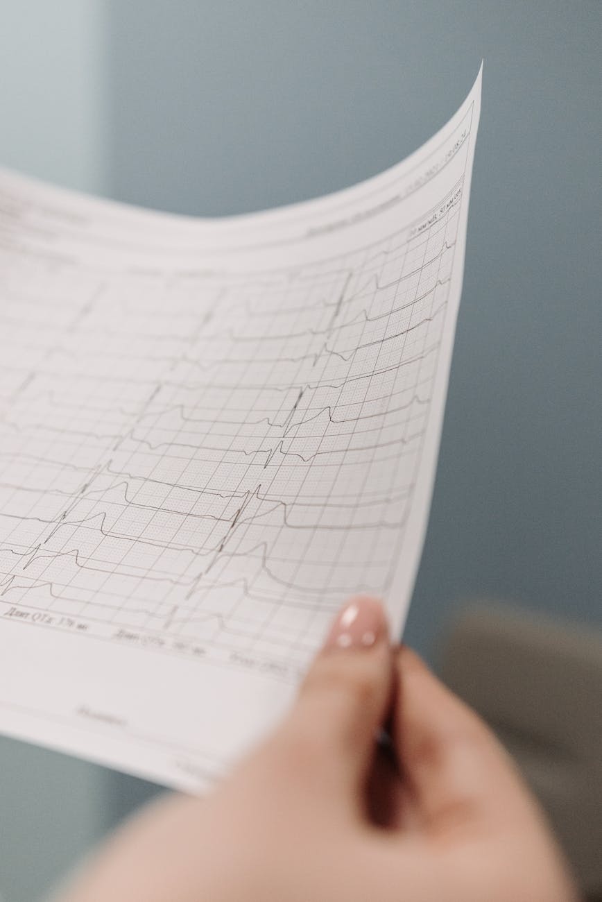 person looking at an electrocardiogram result