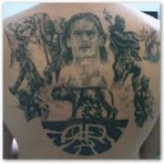Ero indeciso se farmi disegnare anche tre o quattro giapponesi con la macchina fotografica. Calcio Tatoo Francesco Totti Calciopro