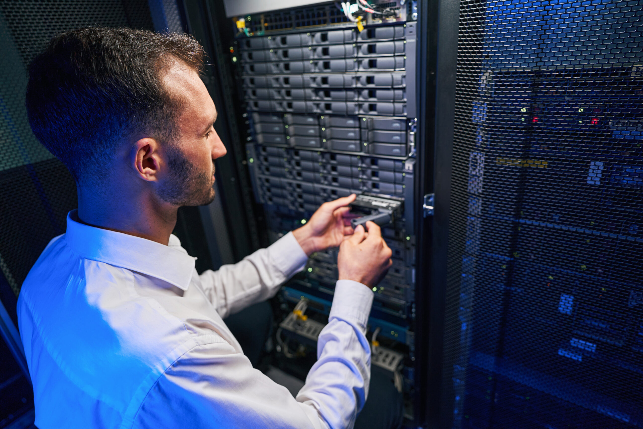 a technician troubleshooting server indoors