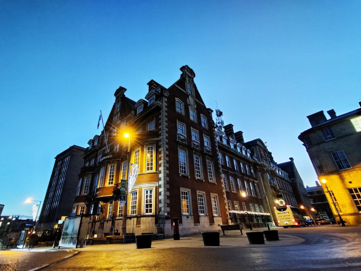 The Grand in York. An ornate old building lit up at dawn