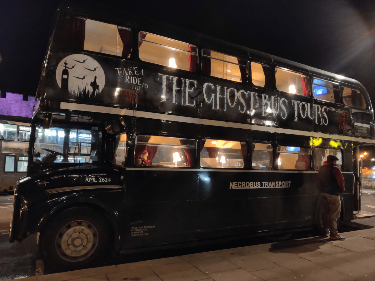 It's night time, and it's a close up picture of a York Ghost Bus Tour, one of the spooky experiences you can have in the city