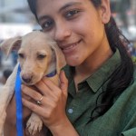 Aditi Balan with a puppy