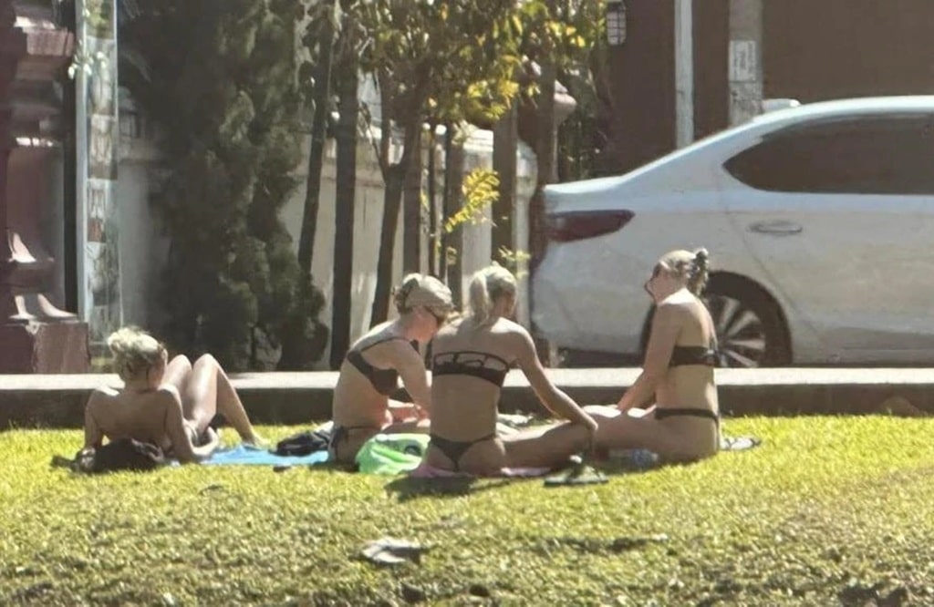 Tourist Sunbathing in Bikinis By Chiang Mai Temple Stirs Controversy
