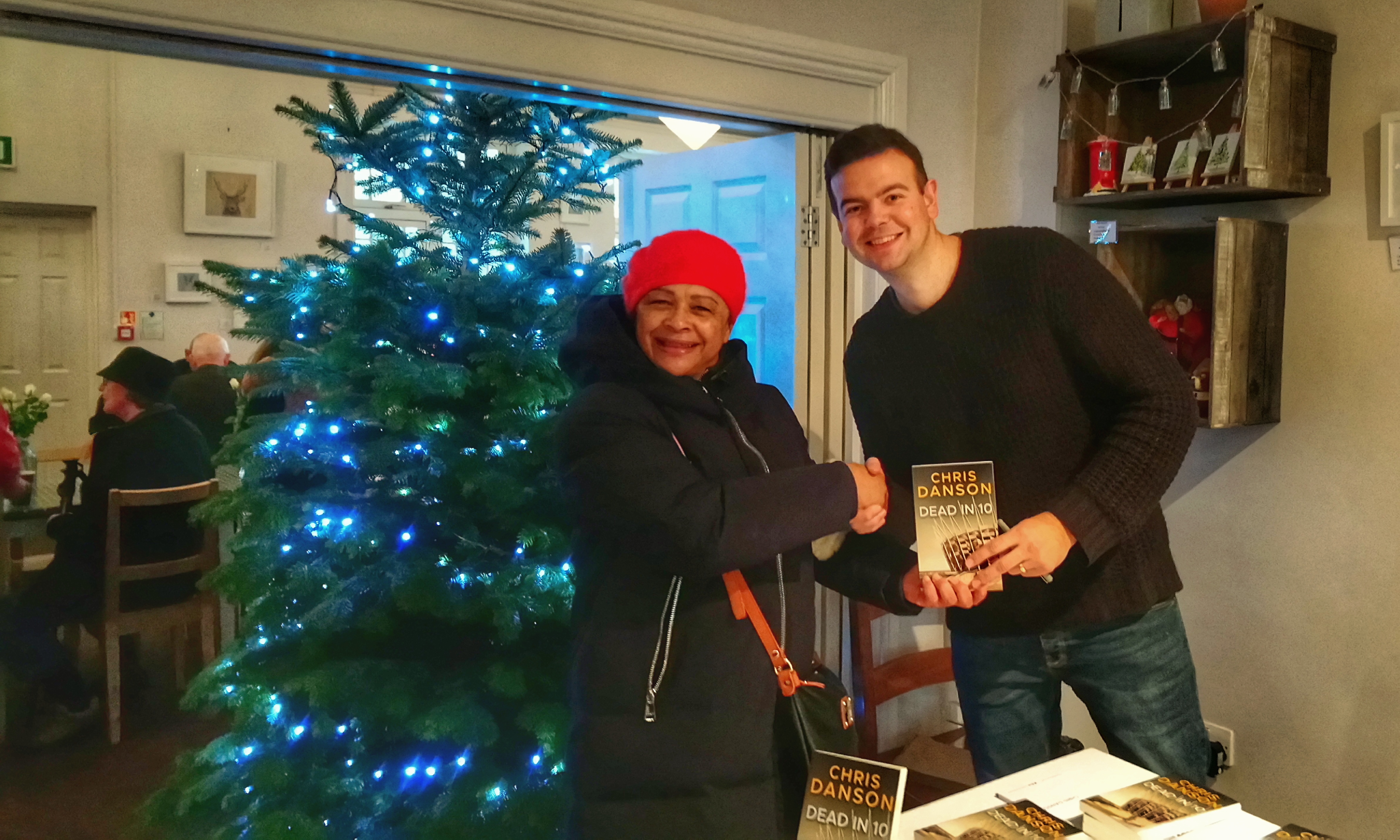 Meeting a reader at the Watford book signing event, 12th December 2018