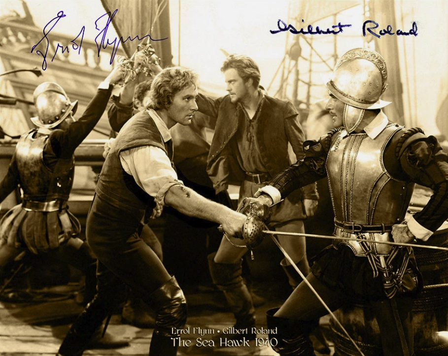 An autographed photo of Errol Flynn.