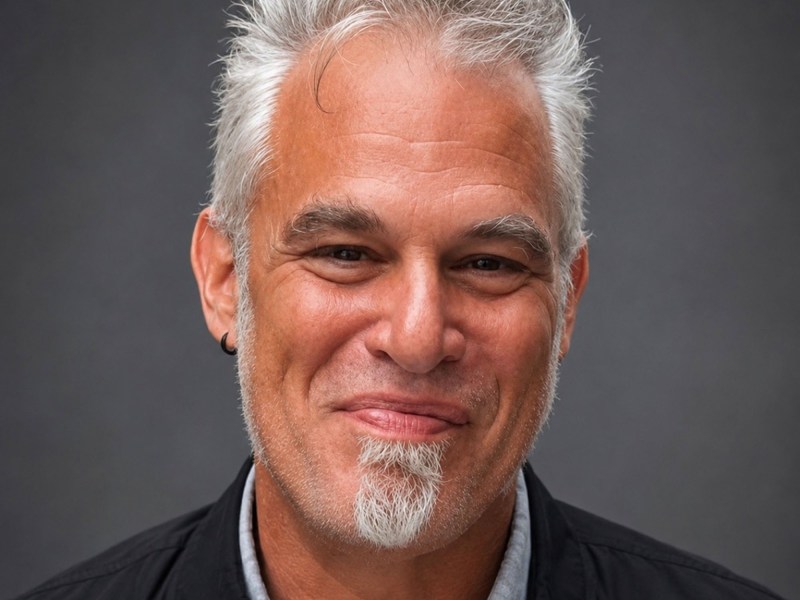 A photo of Ric Orlando.
