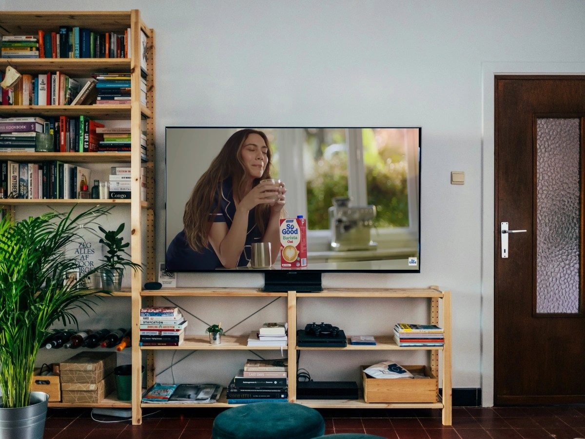 Video advertising campaign displayed on a TV in a home living room