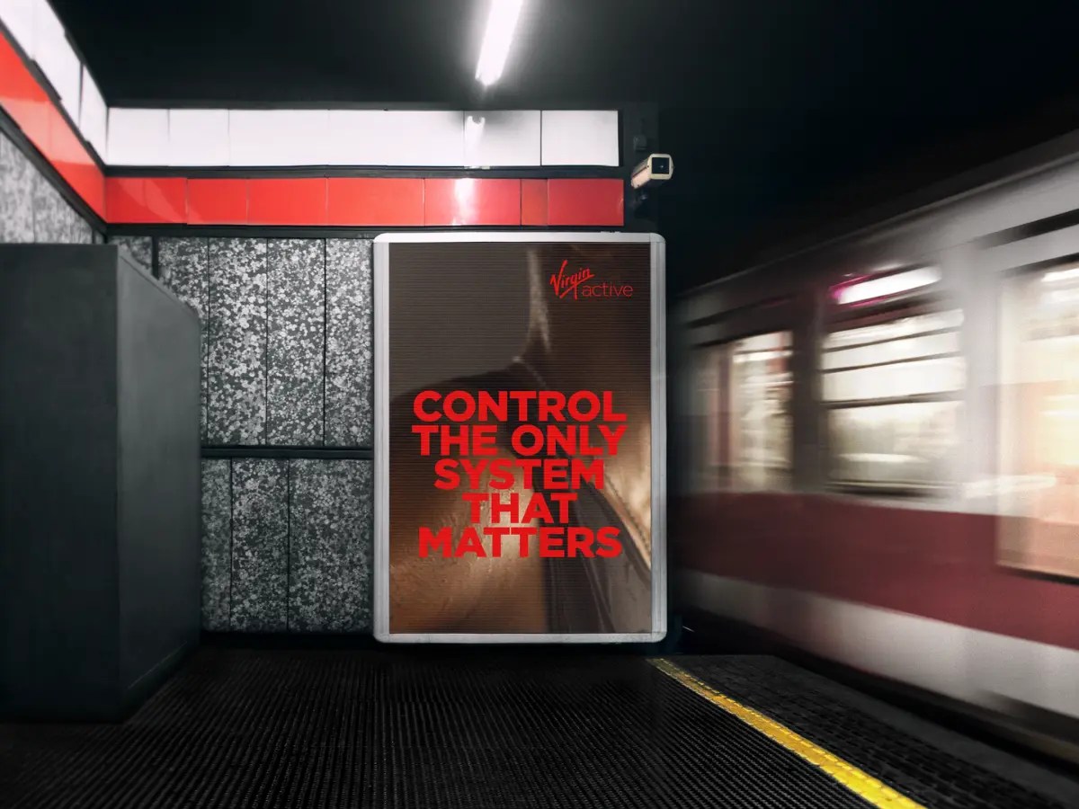 Virgin Active programmatic OOH advertising displayed at a train station