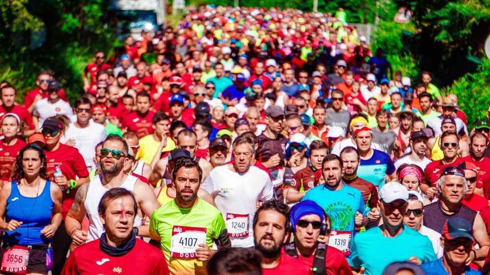 crowd of male and female runners