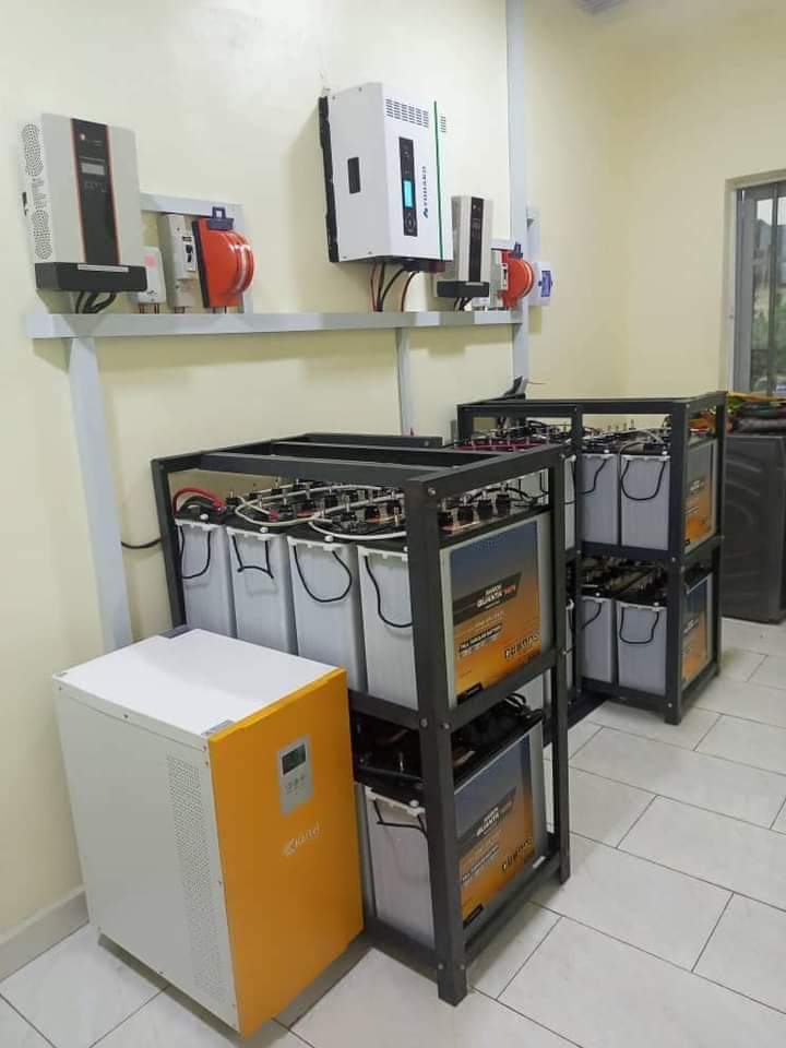 Solar inverter system in a residential setting installed as part of a 10kVA indoor backup power system for efficient energy management.