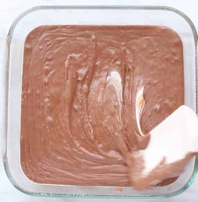 fudge being spread in a pan