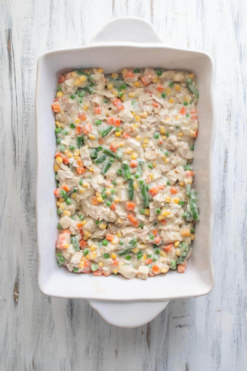 chicken pot pie mixture in casserole dish