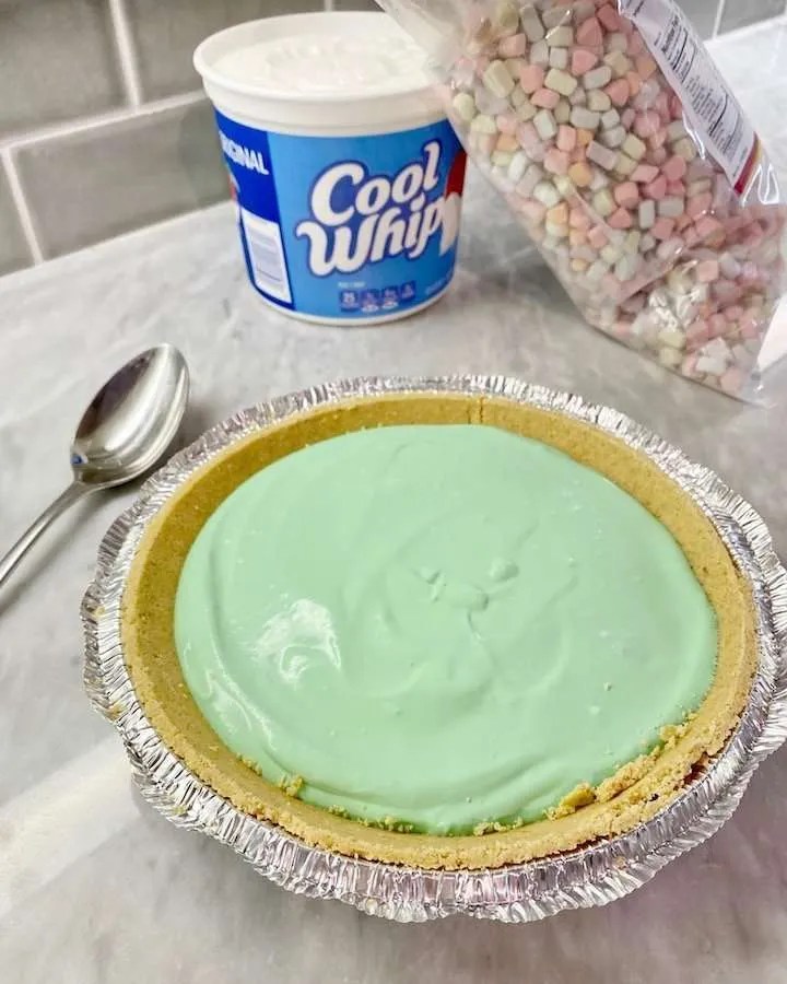 Pour the mixture into the pie crust.