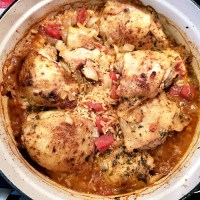 This easy chicken and rice recipe is a one pot meal that you won't want to miss out on! Using bone-in chicken thighs, tomatoes, rice and onions. Perfect comfort food meal for a weeknight and feeds the whole family! via @DashOfEvans