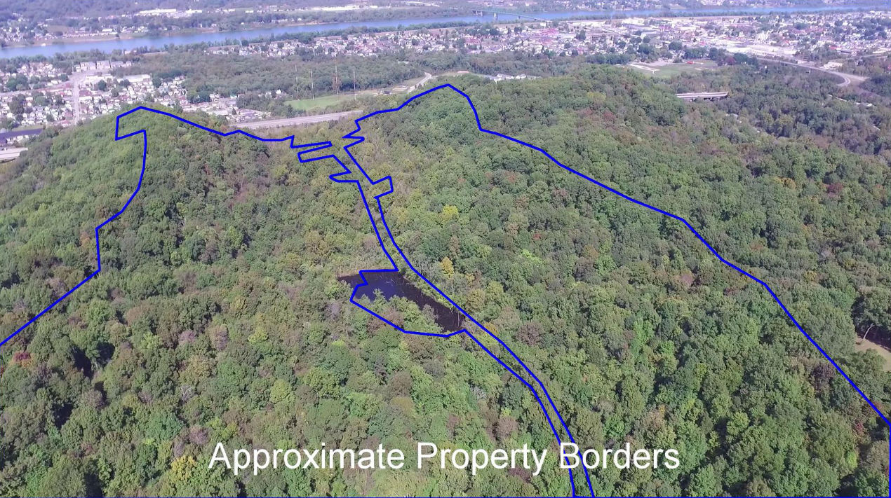 70+ Acres Near Huntington with Pond and I-64 Freeway Frontage