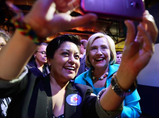 Hillary Clinton takes a selfie with a supporter after delivering her speech on Aug. 4 at La Rumba in Denver. Clinton, one of the presidential candidates trying to gain support for the Democratic nomination, held her first campaign event outside of early primary states in Colorado. (Brent Lewis, The Denver Post)