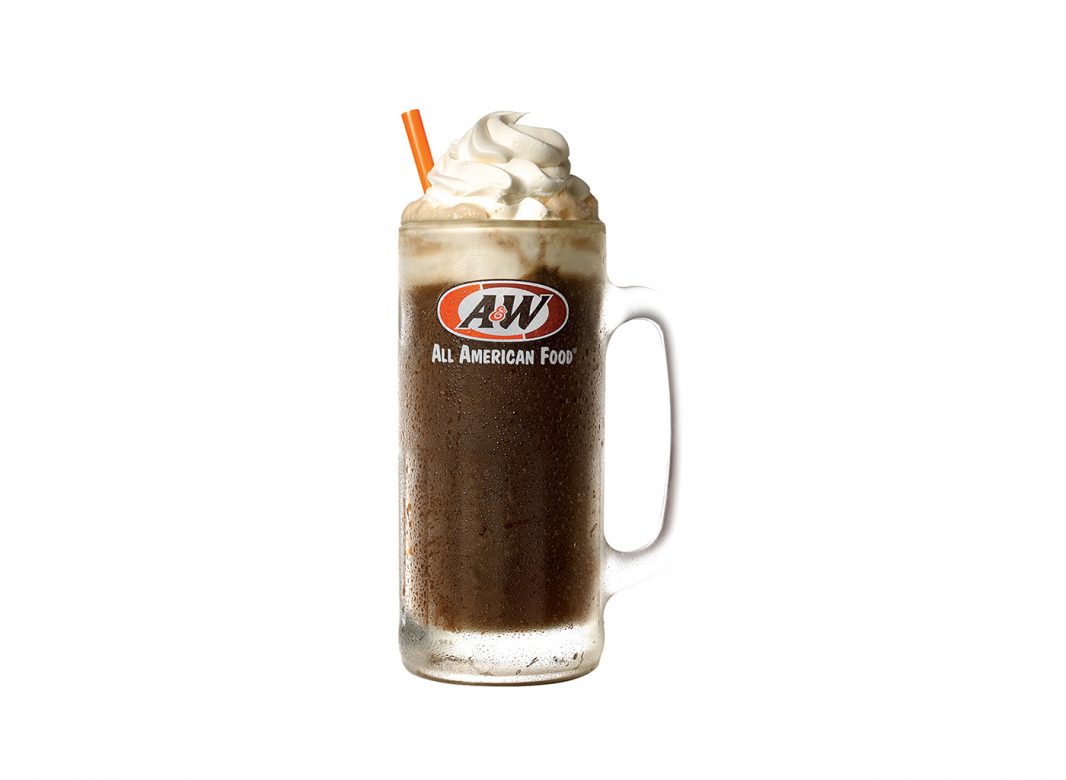 A frosty glass mug of A&W root beer, topped with a head of foam.