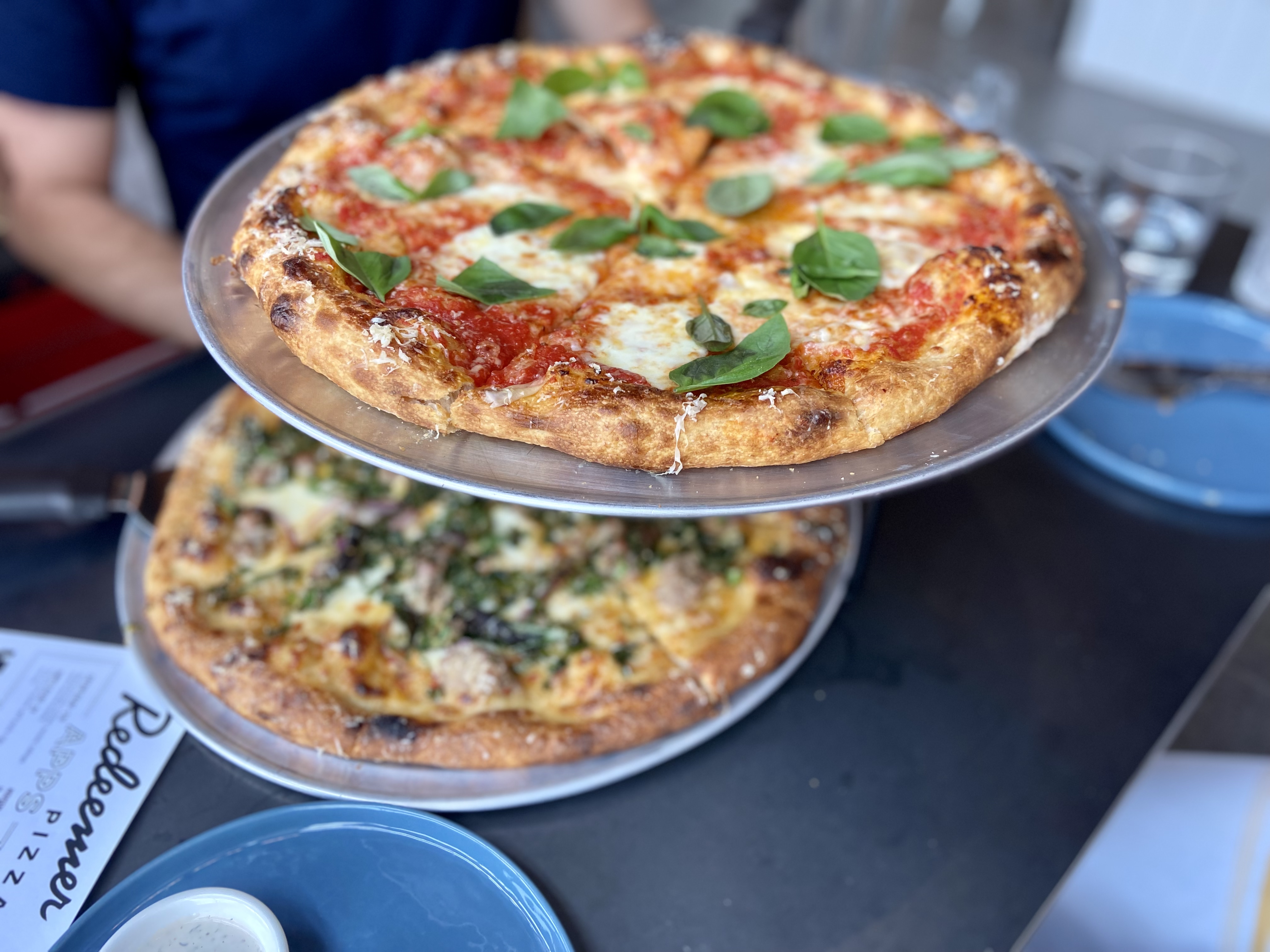 Redeemer pizza brings the San Marzano tomato and basil, kale and chile, all the mushrooms and more on its pizzas served sit-down style and from a back patio window. (Josie Sexton, The Denver Post)