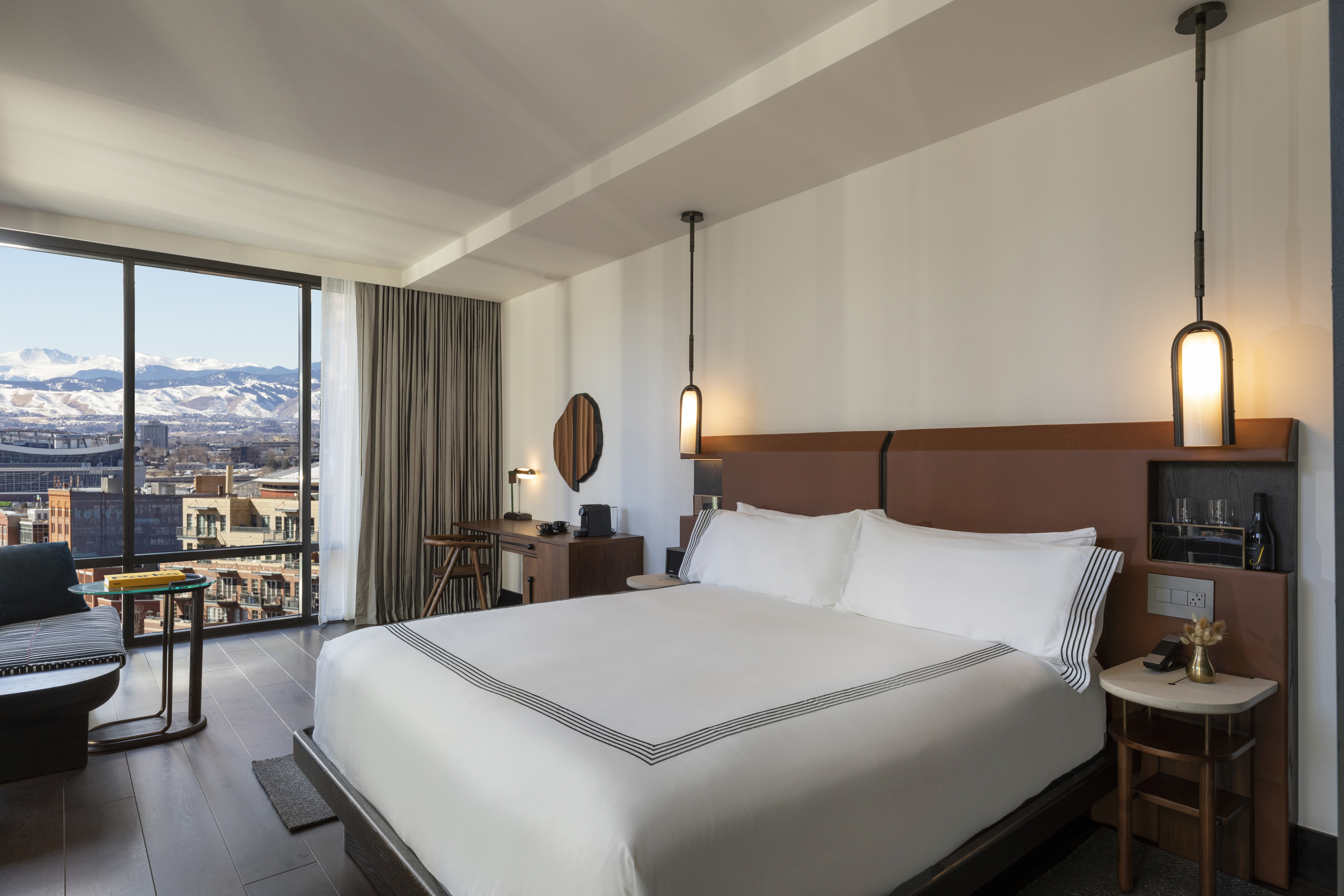 A guestroom at Thompson Denver hotel, ...