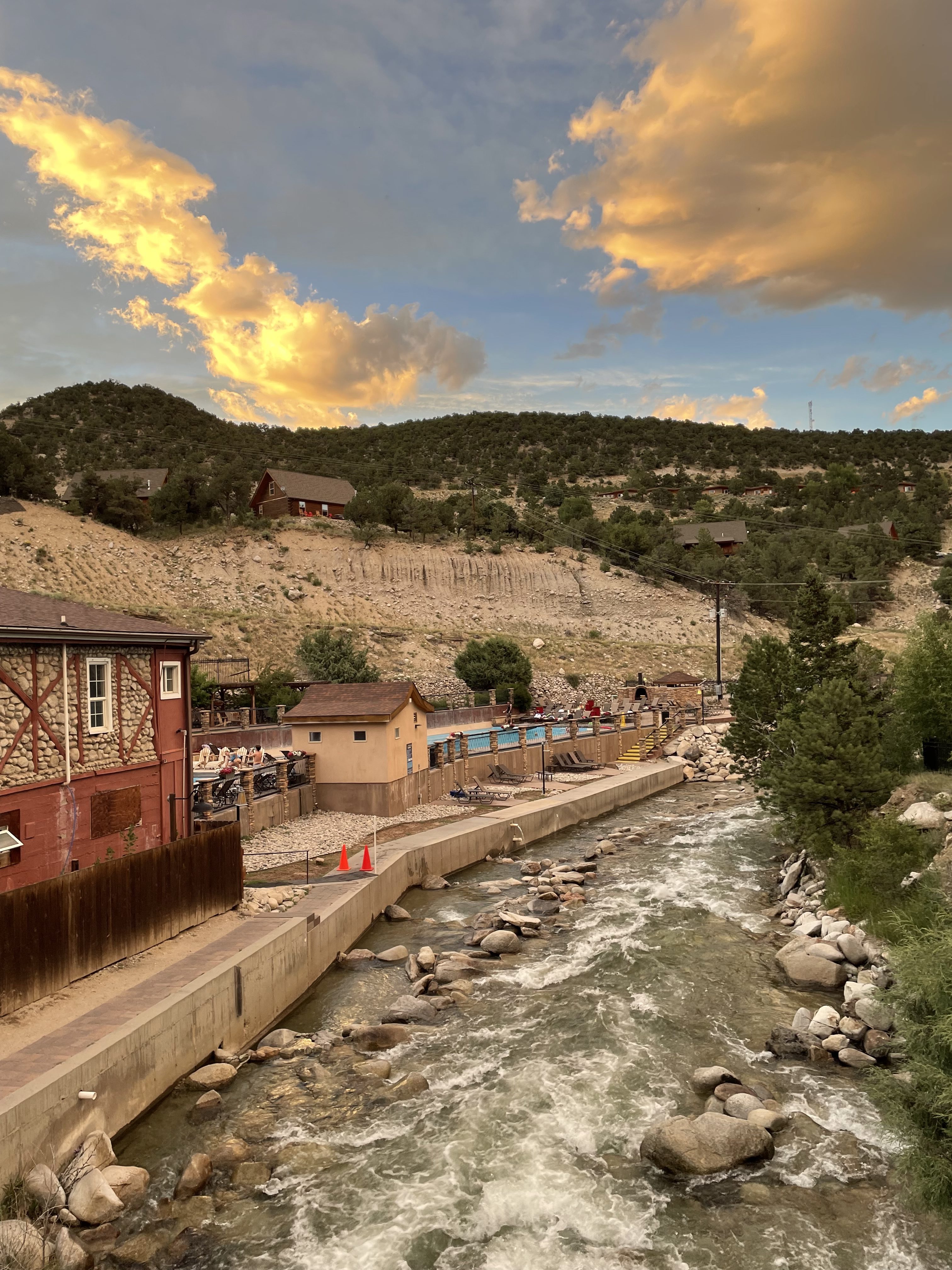 The Chalk Creek that runs alongside the historic bathhouse at Mount Princeton Hot Springs can provide both natural pools for a warm soak or a cold plunge, depending on conditions. (Photo by Mindy Sink/Special to The Denver Post)