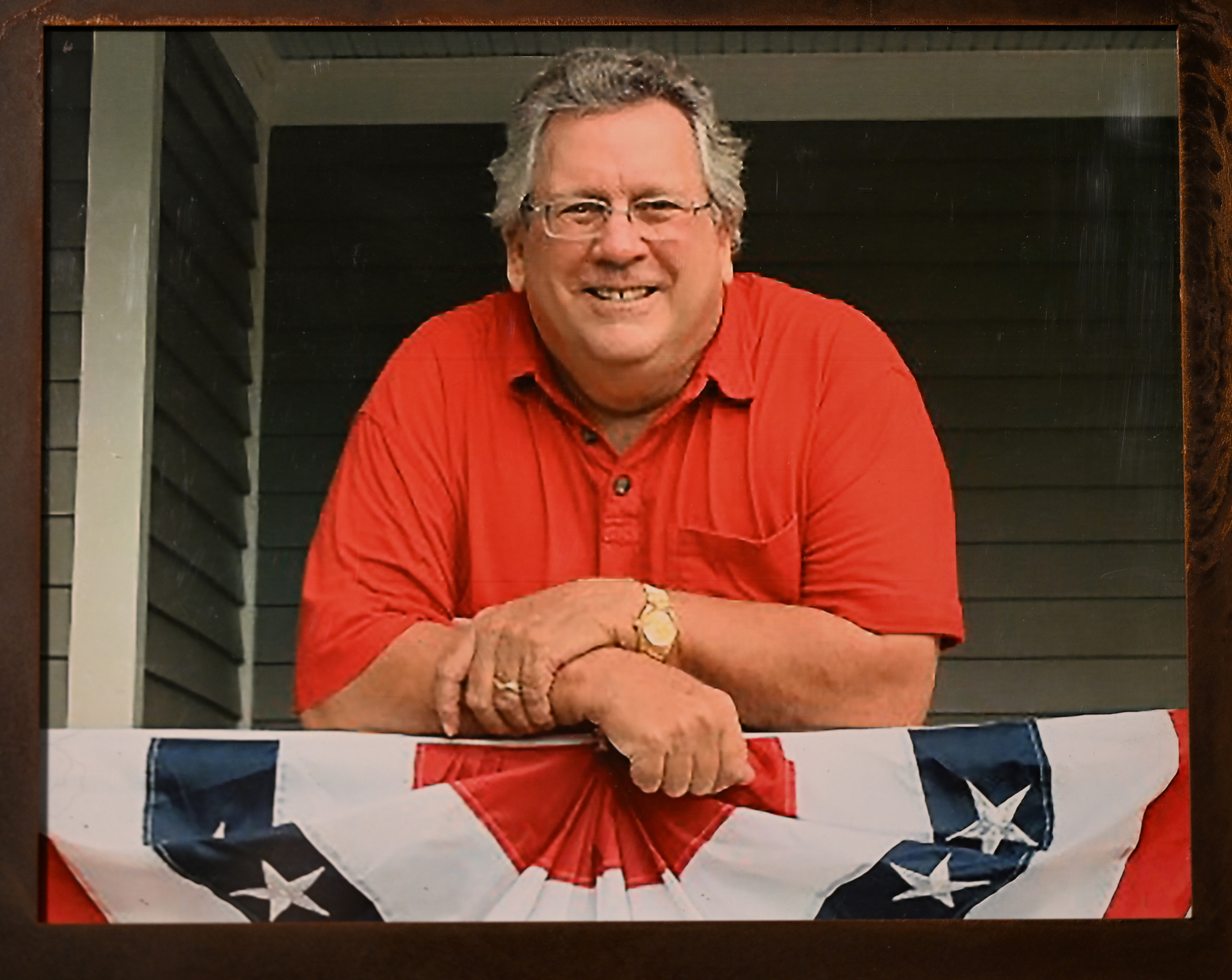 GOLDEN, CO - JUNE 26: A photo of Chris Avery, husband to Kathryn Avery who founded Restoration Ranch on June 26, 2023 in Golden, Colorado. Kathryn Severns Avery founded Restoration Ranch after her husband, Chris Avery, was killed in a car accident in 2020 when robbery suspects t-boned him in an intersection fleeing the scene of their crime in Lakewood. Avery bought and founded the ranch to offer it as a respite and safe space for first responders of all kinds who have responded to crisis situations. She wants it to provide a place to recuperate. Restoration Ranch Colorado supports dispatchers, first responders, emergency department personnel, members of the judiciary, and their families by providing access to opportunities for relaxation, reflection, recreation, health, and wellness. Keeping the location undisclosed to protect those who retreat to it, Avery describes the property as the perfect place to get away for reflection, relaxation, and recreation. At an altitude above 8,000 feet and just 45 minutes from Denver, the Ranch is secluded but easy to access. It offers 40 acres with pine and aspen trees, large rock outcroppings, and open meadows. She has set it up so there are no costs to the stakeholder groups Ð dispatchers, LEOs, fire/EMS, emergency department personnel, members of the judiciary, and their families. Reservations are on a first come, first served basis. The location of the Ranch is not disclosed to participants until a Waiver and NDA are signed. The ranch and other projects Avery is working on are her way of giving back to the first responders who tended to her dying husband after the fatal crash. (Photo by Helen H. Richardson/The Denver Post)