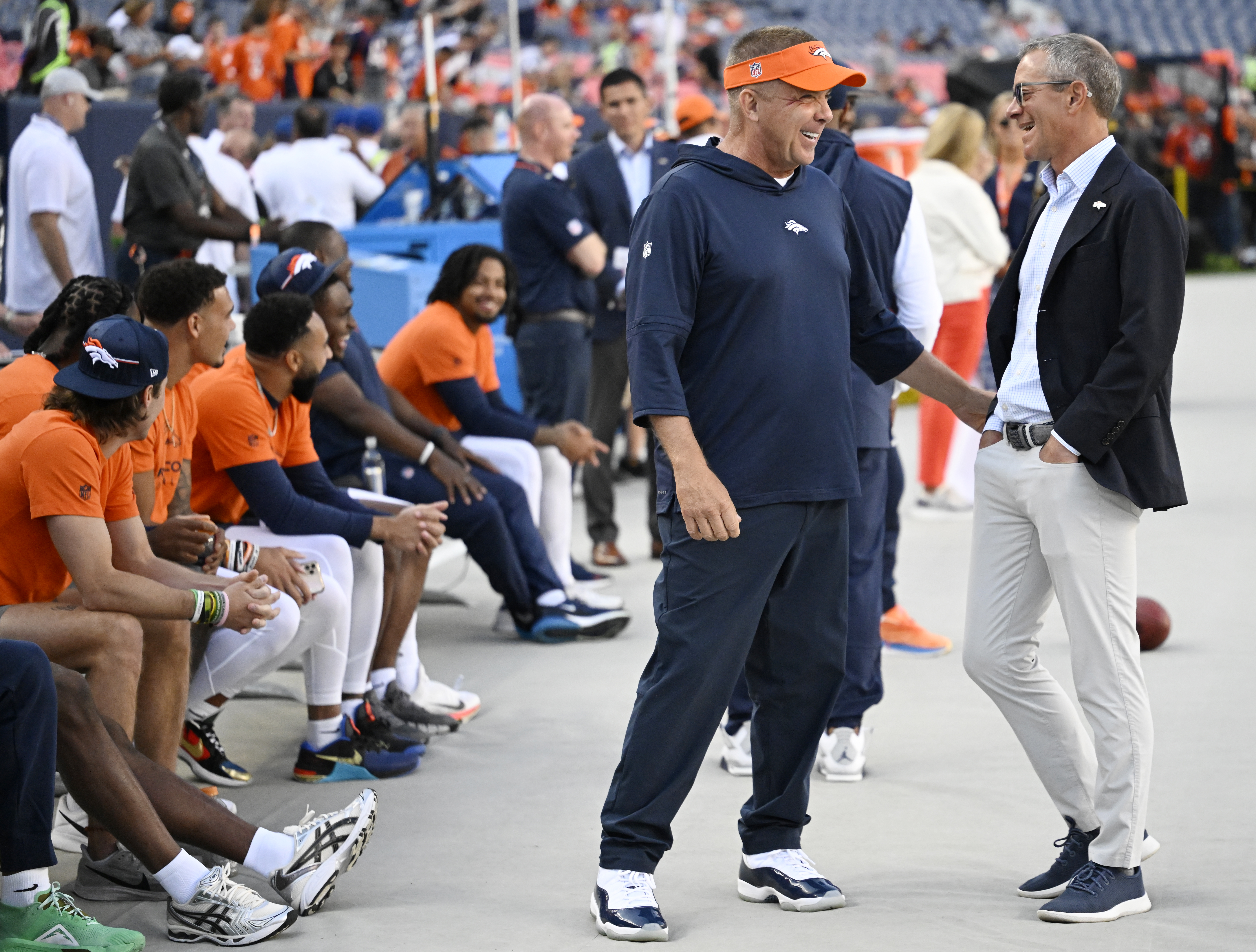 Denver Broncos Head Coach Sean Payton talks with Greg Penner, right, Owner and Chief Executive Officer of the Denver Broncos before a preseason game against the Los Angeles Rams at Empower Field on Aug. 26, 2023, in Denver. (Photo by RJ Sangosti/The Denver Post)