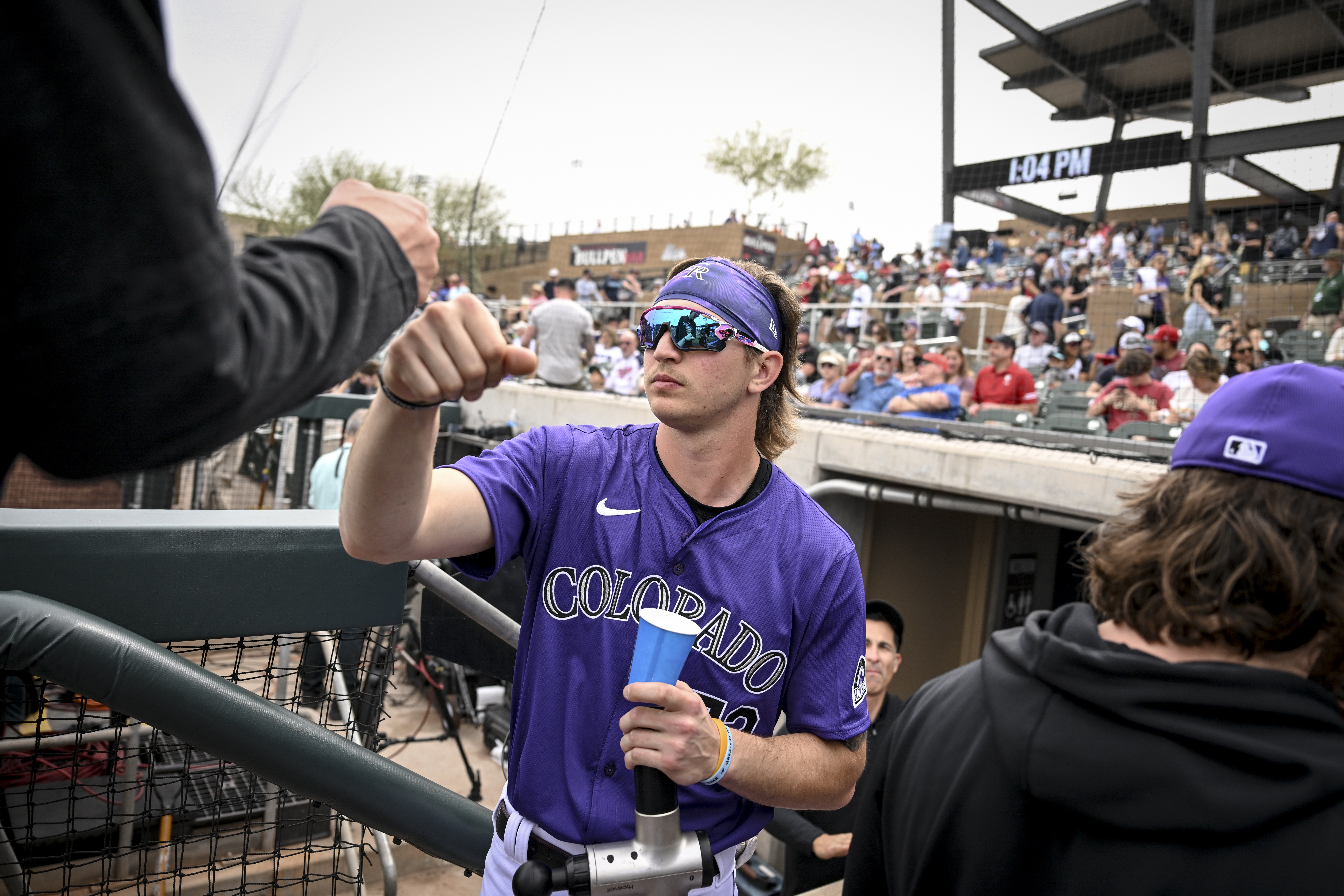 Zac Veen (73) of the Colorado Rockies fist bumps teammates during the opening game of Spring Training - a 3-0 Colorado win over the Arizona Diamondbacks - at Salt River Fields in Scottsdale, Arizona on Friday, Feb. 23, 2024. (Photo by AAron Ontiveroz/The Denver Post)