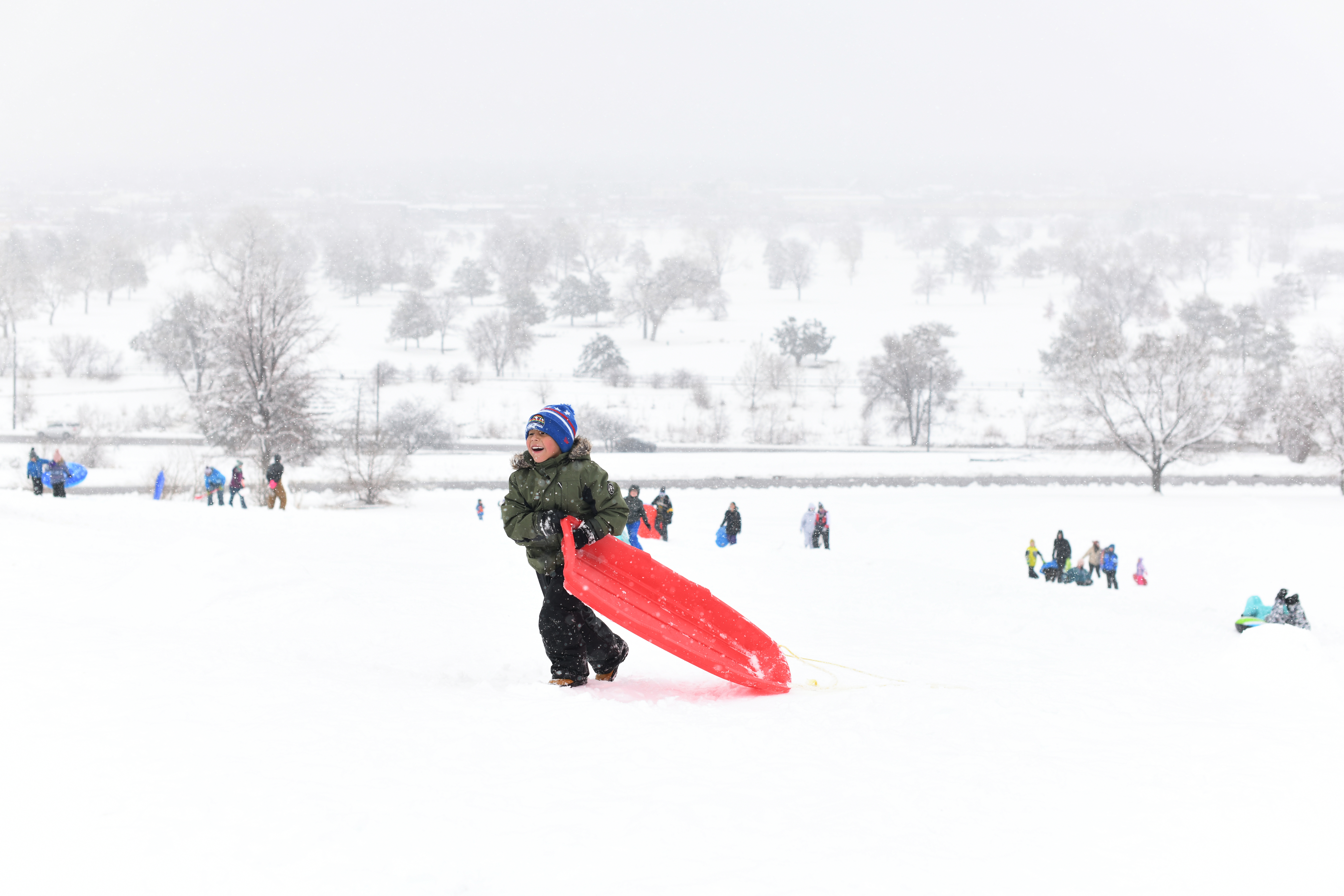 Benicio Barela, 6, goes sledding at Ruby Hill Park in Denver on Thursday, March 14, 2024. A major snowstorm arrived overnight Wednesday and has already dropped more than 2 feet of snow in some areas of the Front Range foothills. (Photo by Hyoung Chang/The Denver Post)