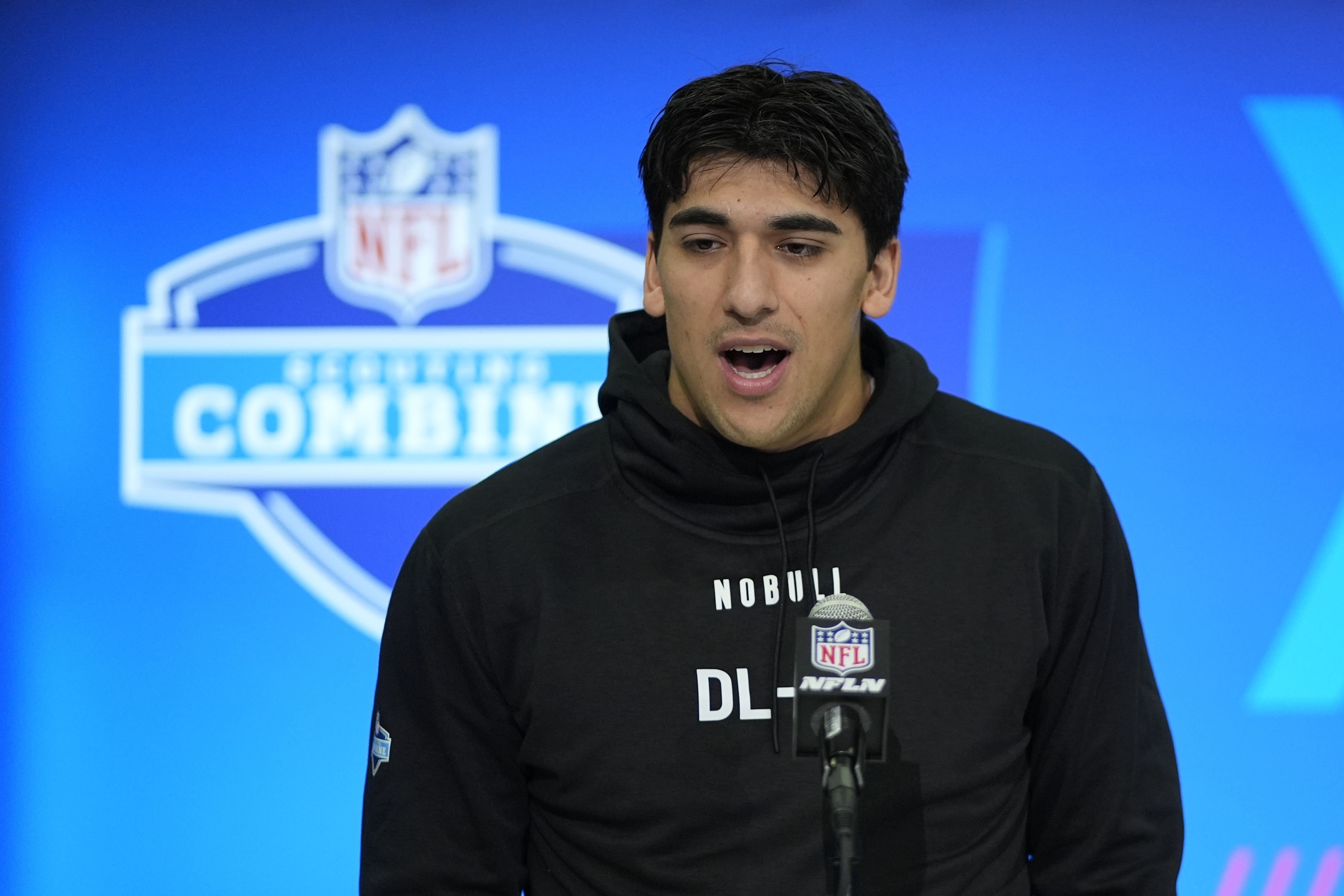 Utah defensive lineman Jonah Elliss speaks during a news conference at the NFL football scouting combine, Wednesday, Feb. 28, 2024, in Indianapolis. (AP Photo/Darron Cummings)