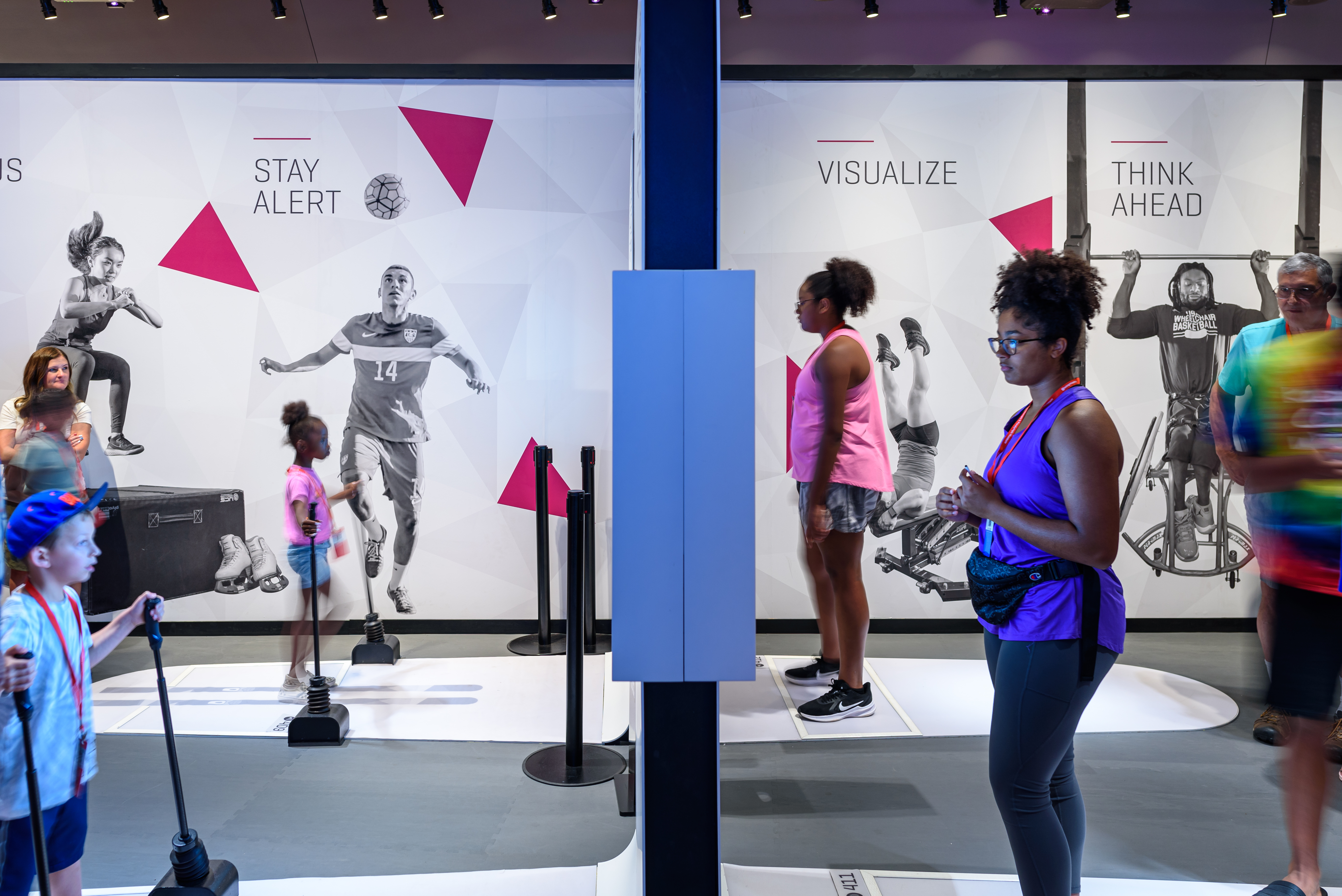 On the third floor of the U.S. Olympic & Paralympic Museum in Colorado Springs, visitors can test their own skills at a half dozen stations. Here, alpine skiing is on the left and sled hockey is on the right. (Richard Bittles, provided by the U.S. Olympic & Paralympic Museum)