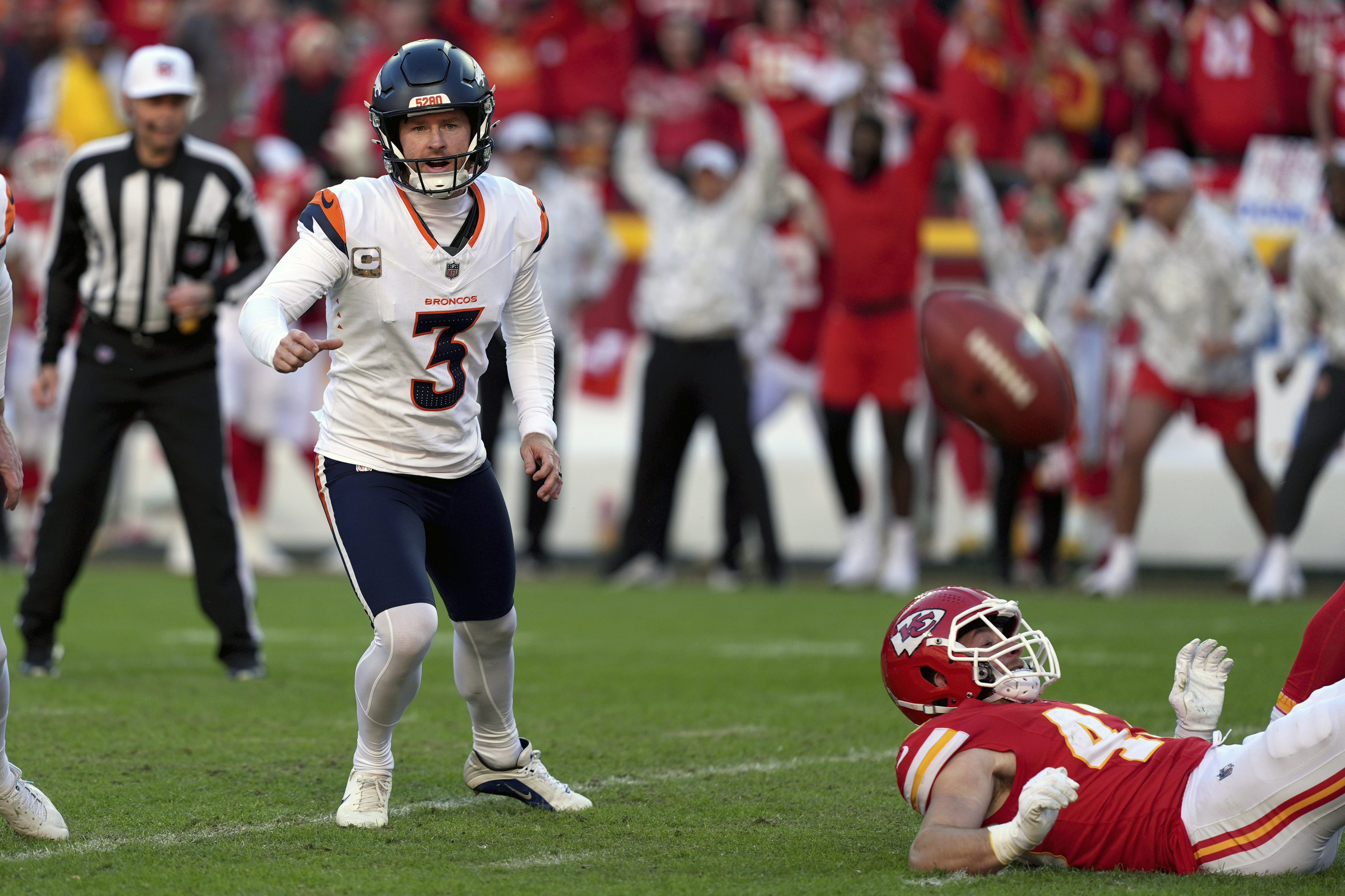 Denver Broncos kicker Wil Lutz (3) chases after the ball after his last-second field goal attempt was blocked during the second half of a game against the Kansas City Chiefs on Nov. 10, 2024, in Kansas City, Missouri. (AP Photo/Charlie Riedel)