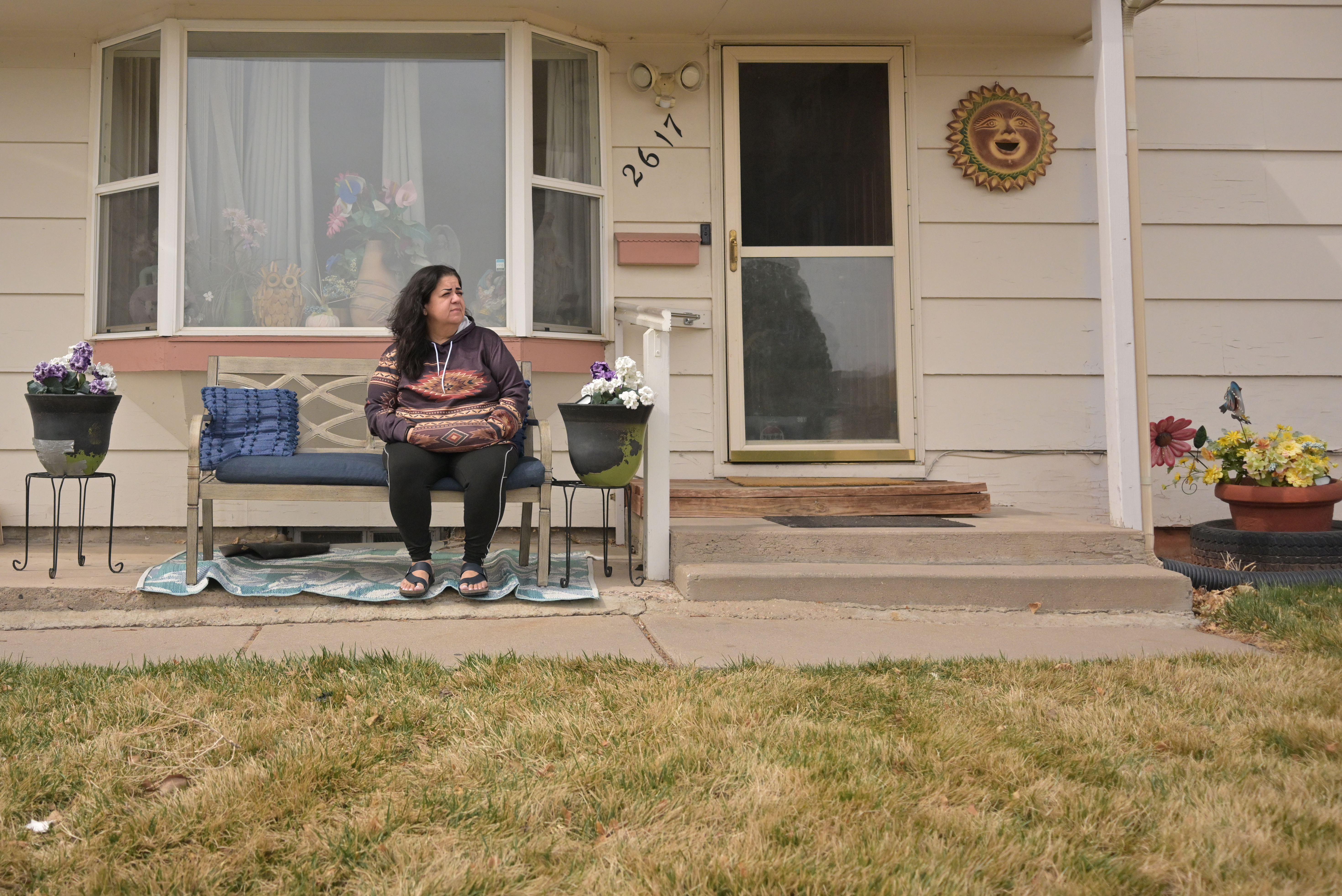 Bernie Esquibel-Tennant sits outside her home in Pueblo, Colorado, on March 19, 2025. (Photo by RJ Sangosti/The Denver Post)