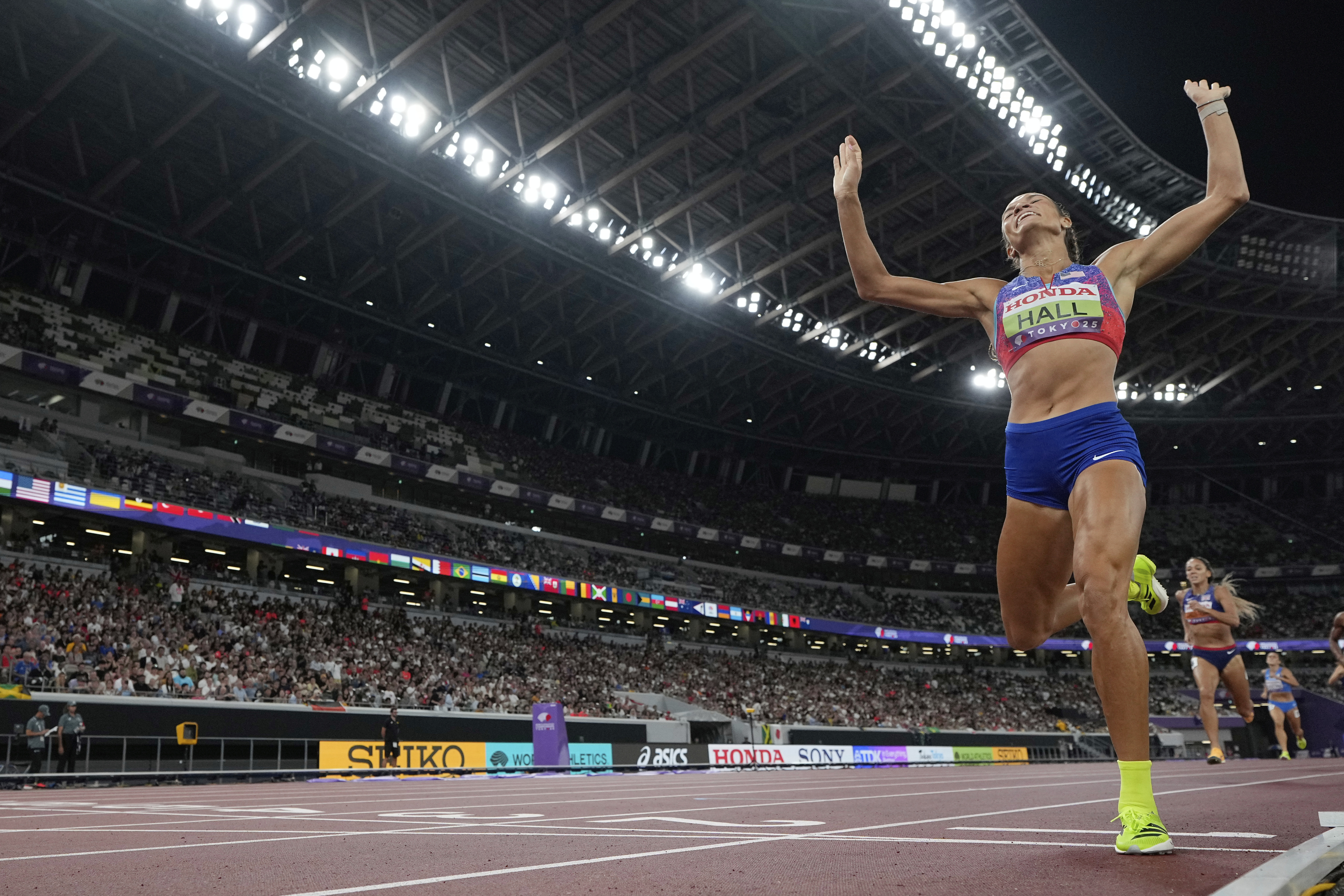 United States' Anna Hall celebrates as she wins the heptathlon at the World Athletics Championships in Tokyo, Saturday, Sept. 20, 2025. (AP Photo/David J. Phillip)
