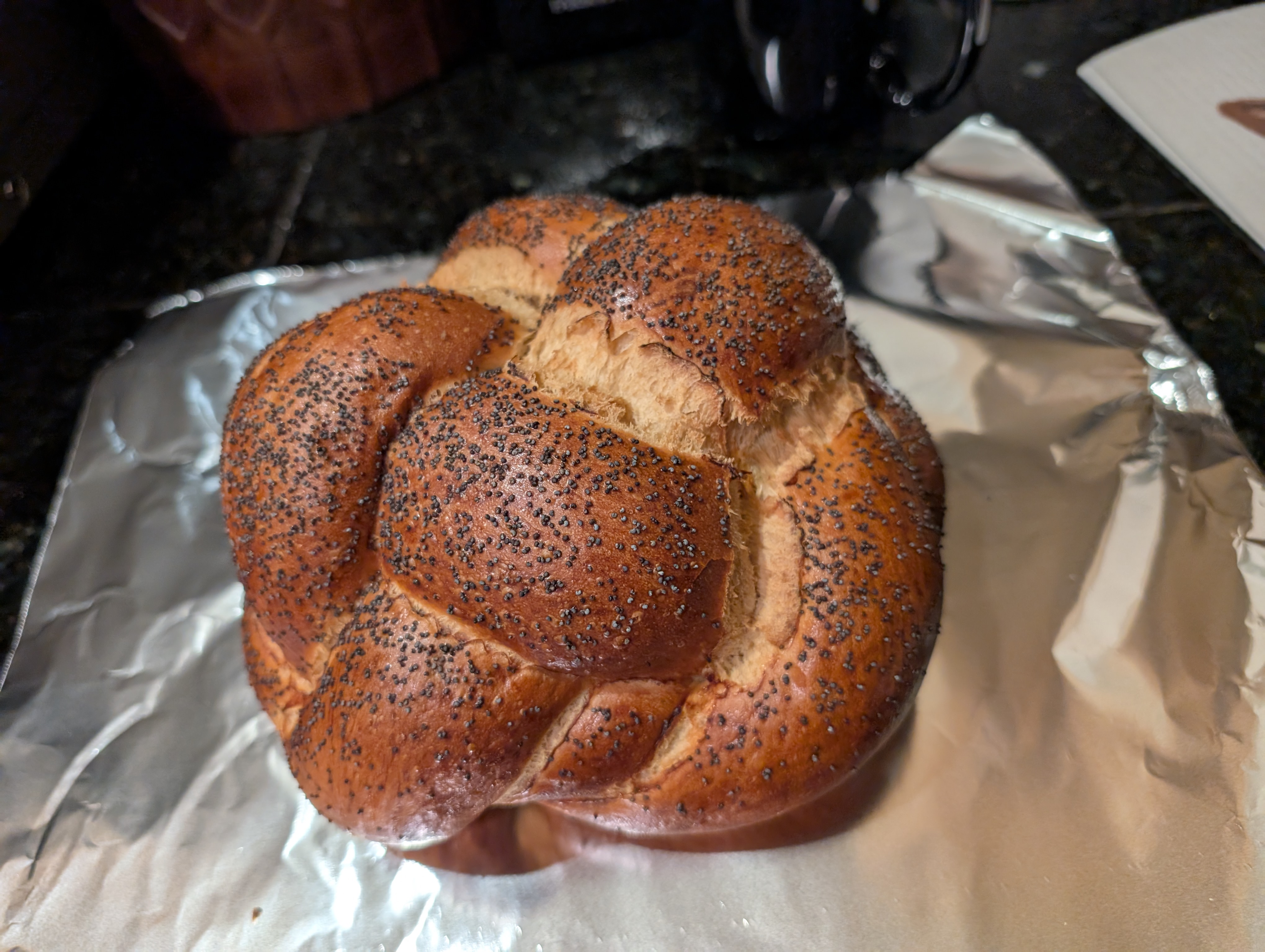 A round challah loaf that was prepared and baked at "The Art and Soul of Challah", a baking class at Rebel Bread in Denver on Tuesday, Sept. 23, 2025. (Miguel Otarola/The Denver Post)