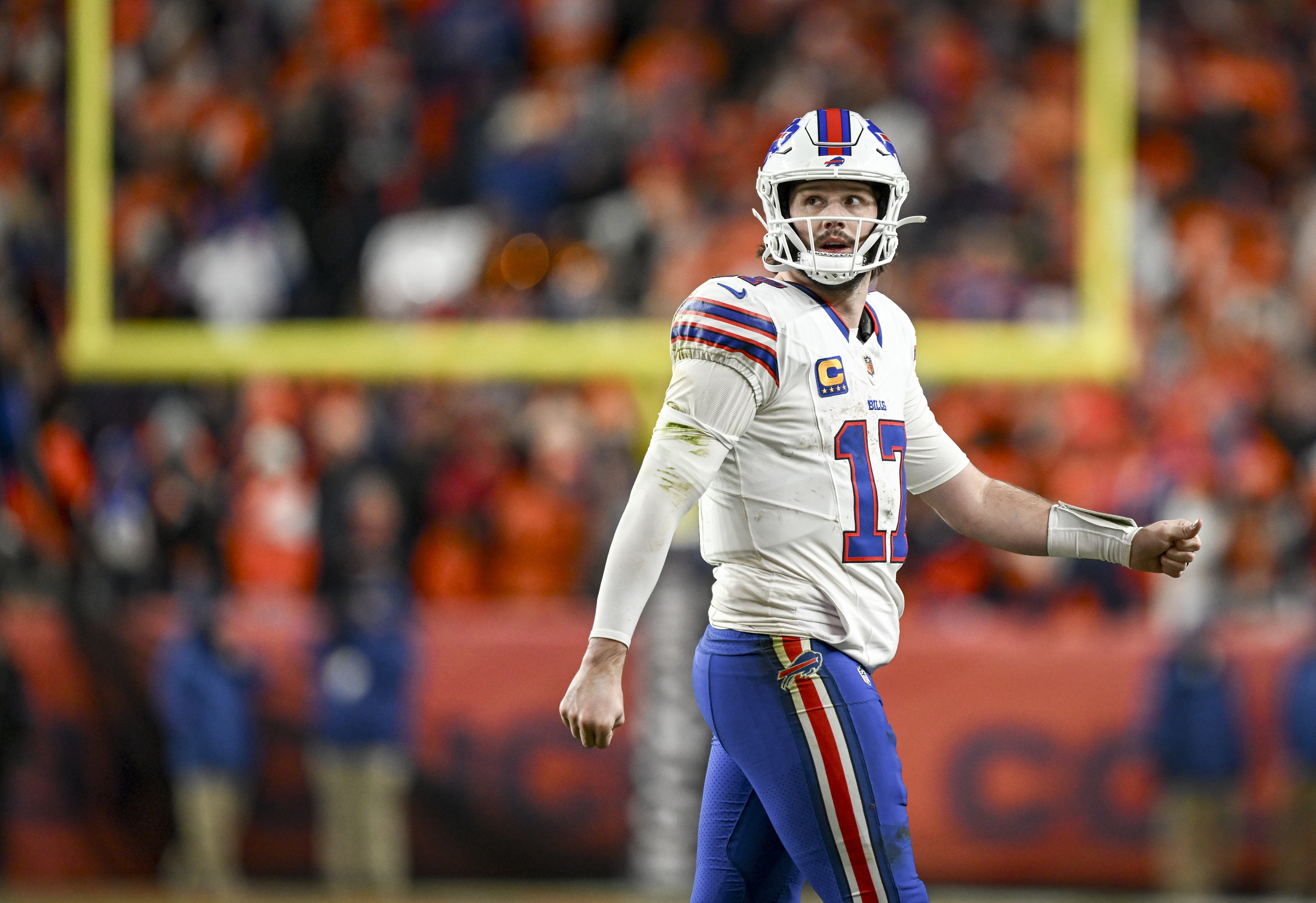 Josh Allen (17) of the Buffalo Bills reacts to throwing an interception to Ja'quan McMillian (29) of the Denver Broncos during overtime of the Broncos' 33-30 win at Empower Field at Mile High in Denver on Saturday. (Photo by AAron Ontiveroz/The Denver Post)