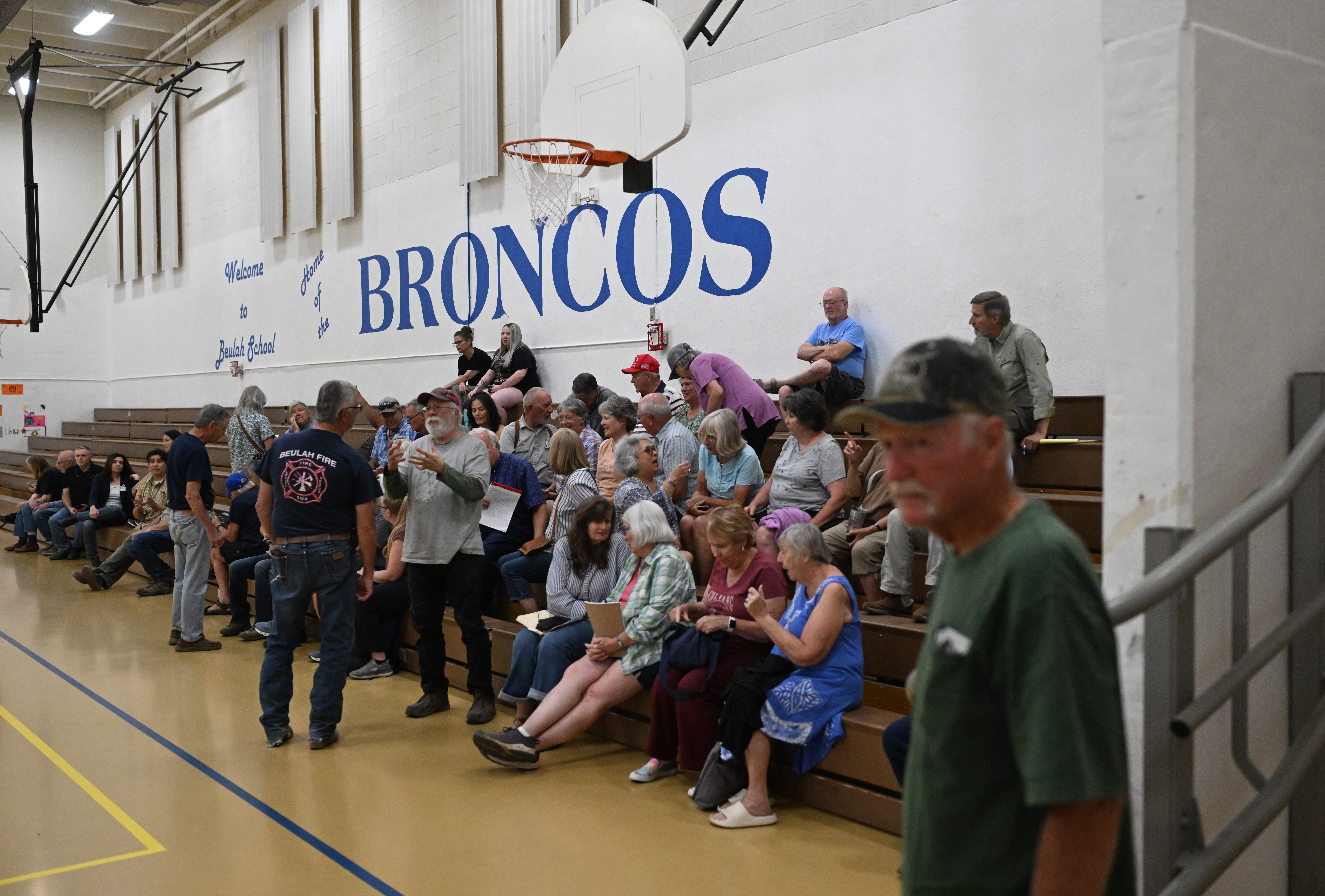 Residents gather at Beulah School for a community meeting about the aftermath of the Aspen Acres Fire in Beulah on Tuesday, Aug. 11, 2026. (Photo by RJ Sangosti/The Denver Post)