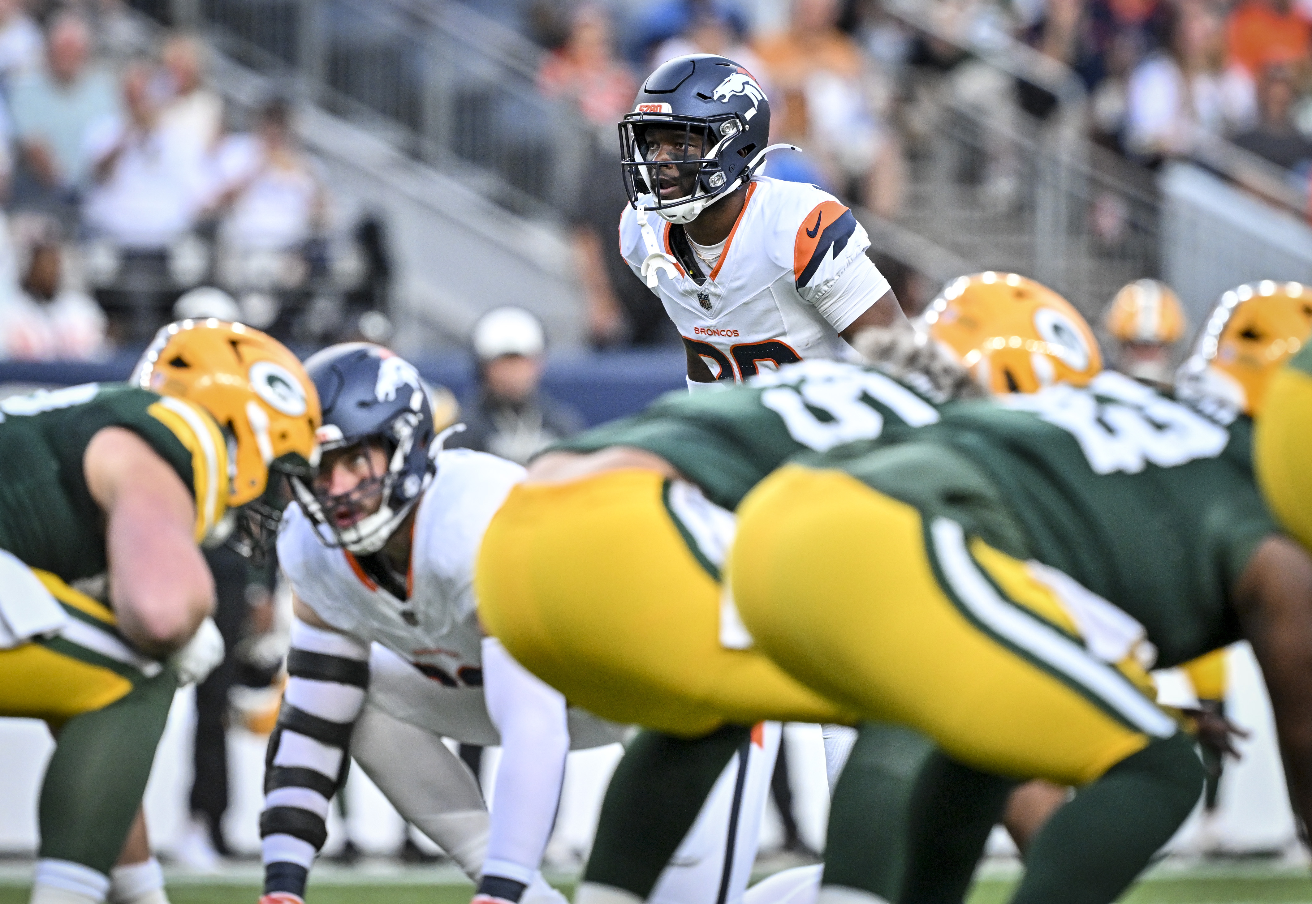 Ja'quan McMillian (29) of the Denver Broncos prepares as Jordan Love (10) of the Green Bay Packers takes a snap during the first quarter at Empower Field at Mile High in Denver, Colorado on Friday, August 21, 2026. (Photo by AAron Ontiveroz/The Denver Post)