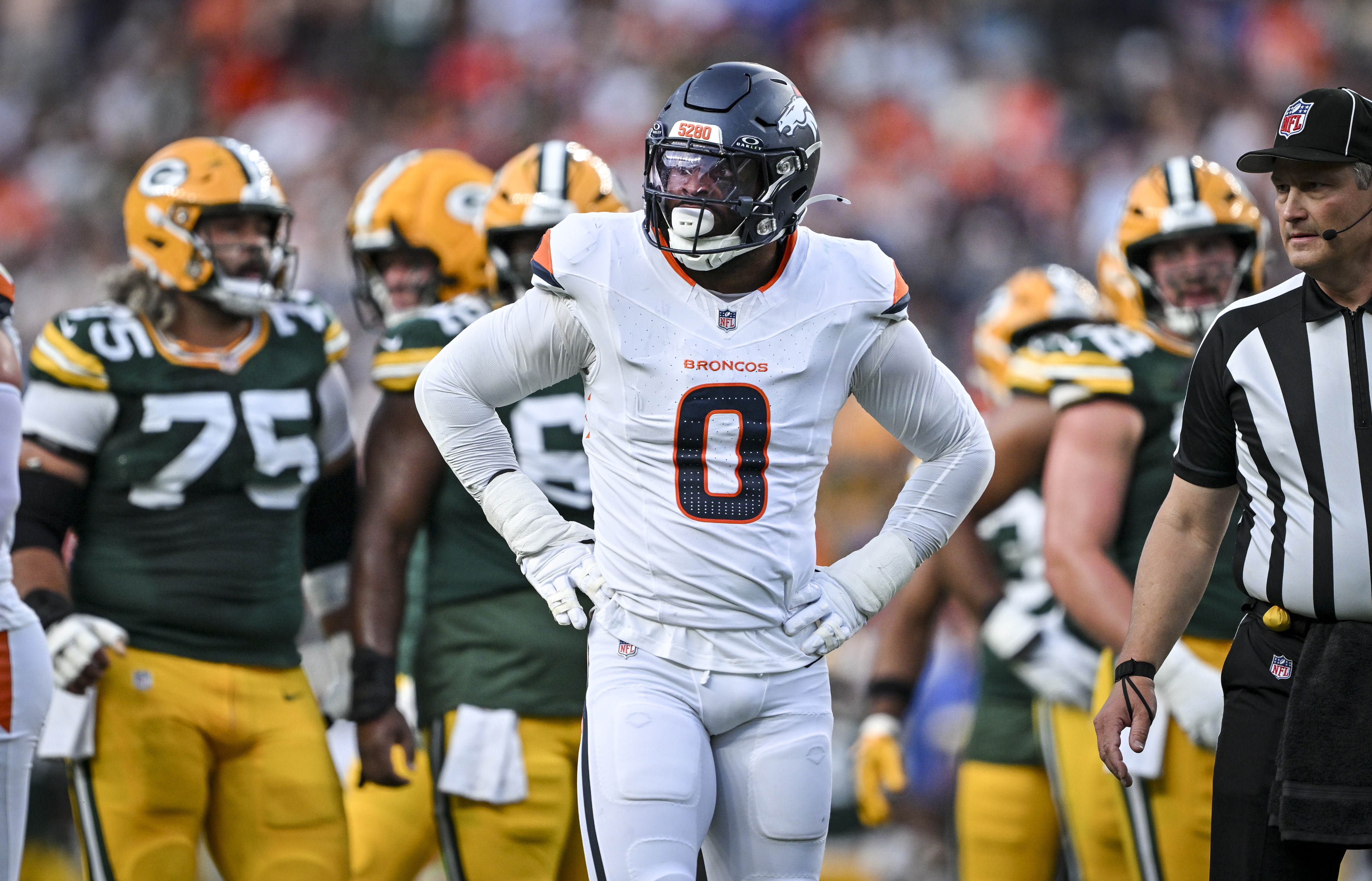 Jonathon Cooper (0) of the Denver Broncos stands between plays during the first quarter against the Green Bay Packers at Empower Field at Mile High in Denver, Colorado on Friday, August 21, 2026. (Photo by AAron Ontiveroz/The Denver Post)